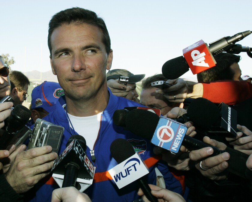 FILE - Florida NCAA college football head coach Urban Meyer talks to reporters after practice in Scottsdale, Ariz., ahead of the BCS Championship game against Ohio State, in this Jan. 8, 2007, file photo. A person familiar with the search says Urban Meyer and the Jacksonville Jaguars are working toward finalizing a deal to make him the team's next head coach. The person spoke to The Associated Press on the condition of anonymity Thursday, Jan. 14, 2021, because a formal agreement was not yet in place. (AP Photo/Ted S. Warren, File)