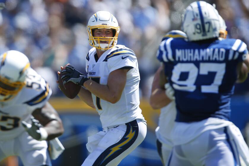 K.C. Alfred  U-T Quarterback Philip Rivers completes 25-of-34 passes attempts for 333 yards and three touchdowns.