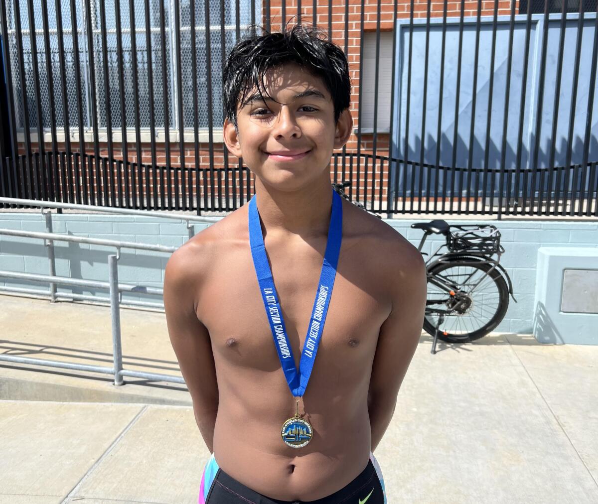 Freshman Josiah Rosales-Cristales, who learned to dive via YouTube, won the City Section diving championship 