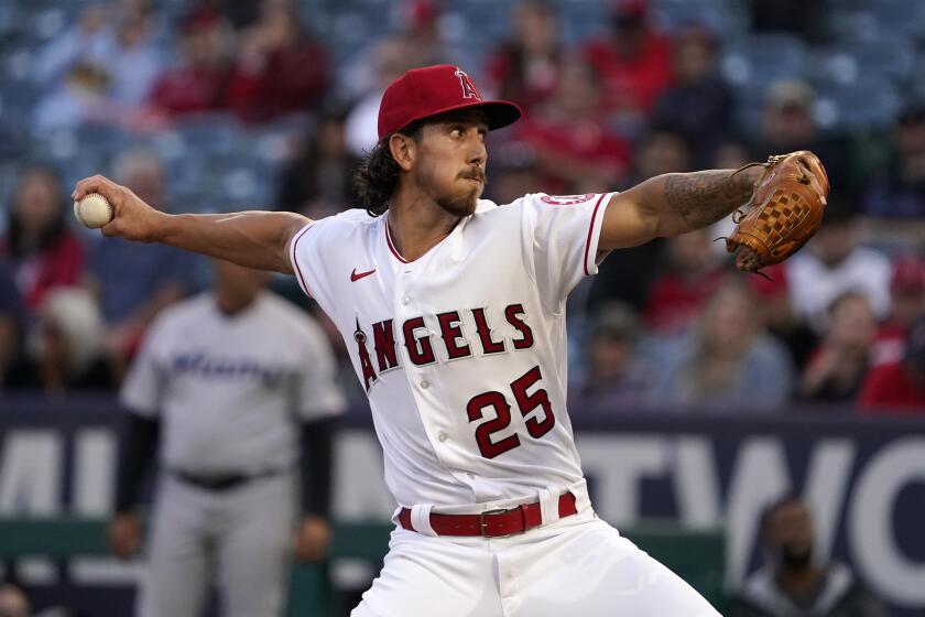Los Angeles Angels relief pitcher Michael Lorenzen throws to the plate during the first inning of a baseball game against the Miami Marlins Monday, April 11, 2022, in Anaheim, Calif. (AP Photo/Mark J. Terrill)