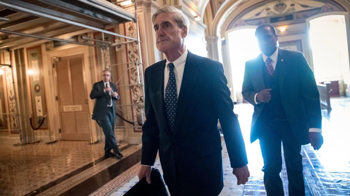 Special Counsel Robert Mueller leaves a closed-door meeting with members of the Senate Judiciary Committee on June 21.