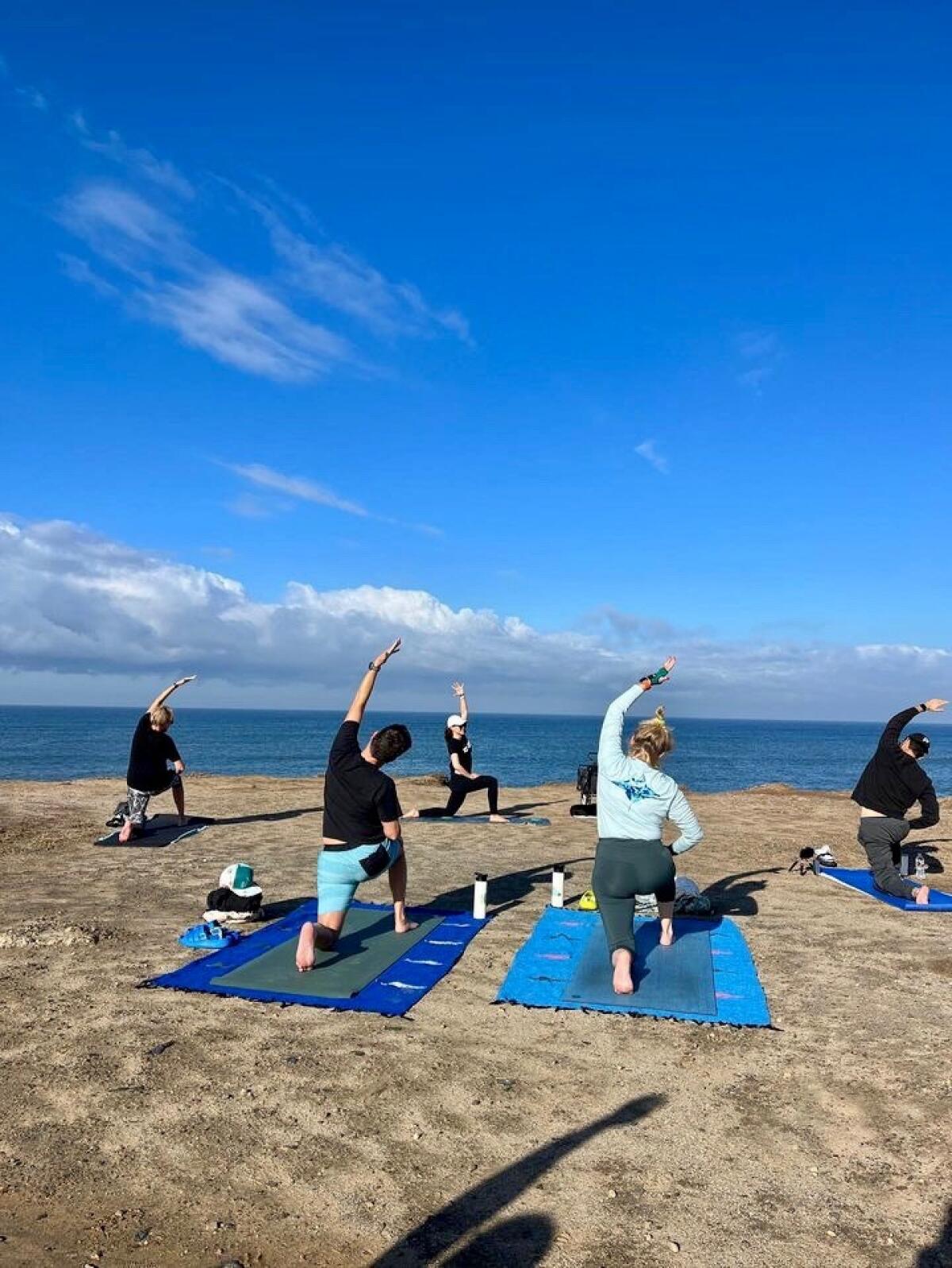 Amy Baack teaches a free yoga class at Sunset Cliffs Natural Park in San Diego