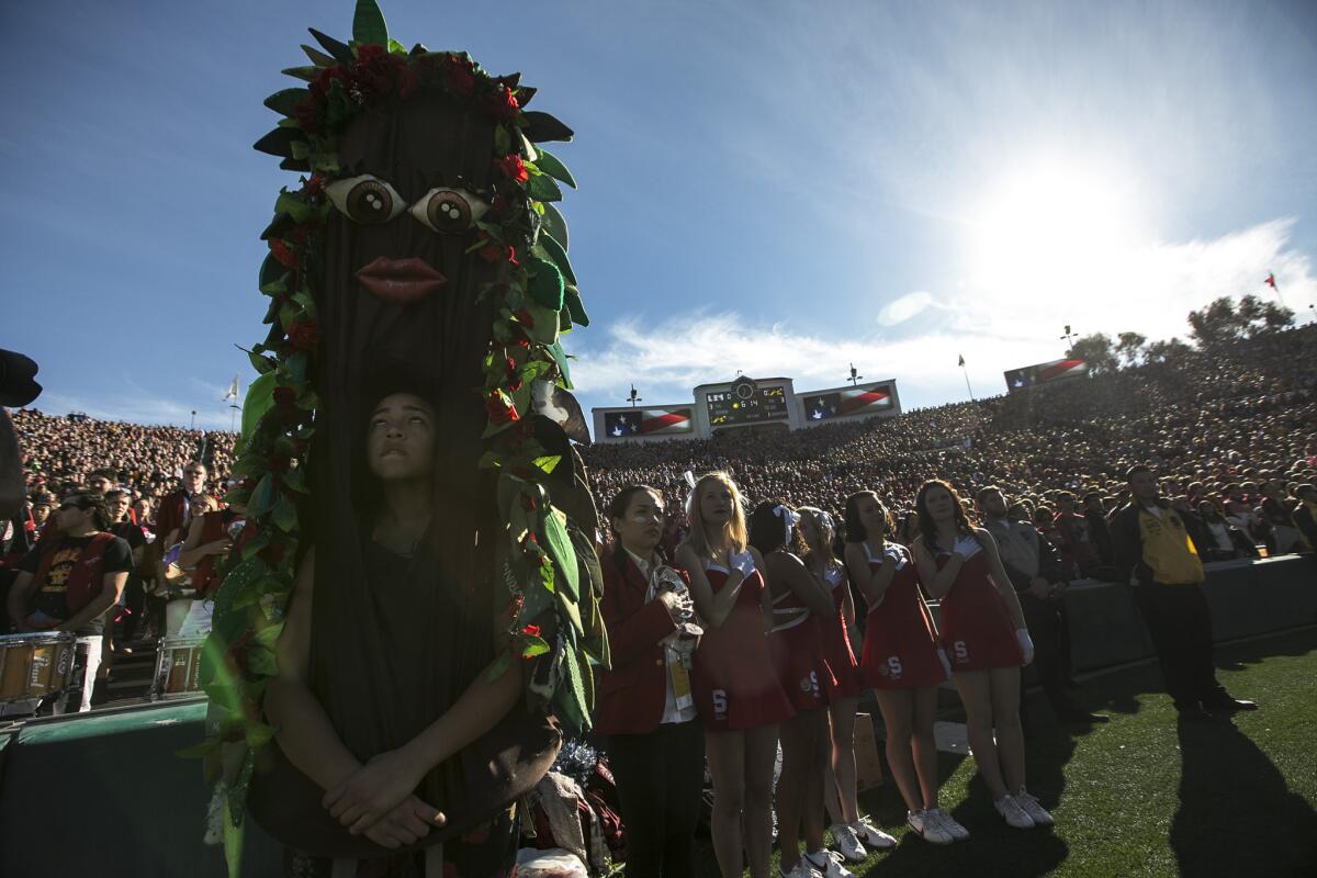 The Stanford pep squad stands at attention for the national anthem Jan. 1 at the Rose Bowl.