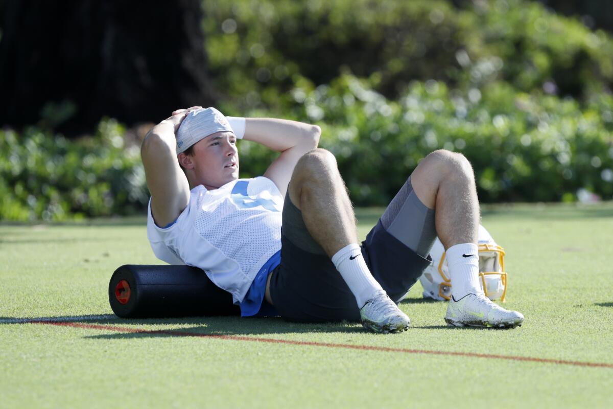 Chargers kicker Michael Badgley stretches and relaxes during camp.