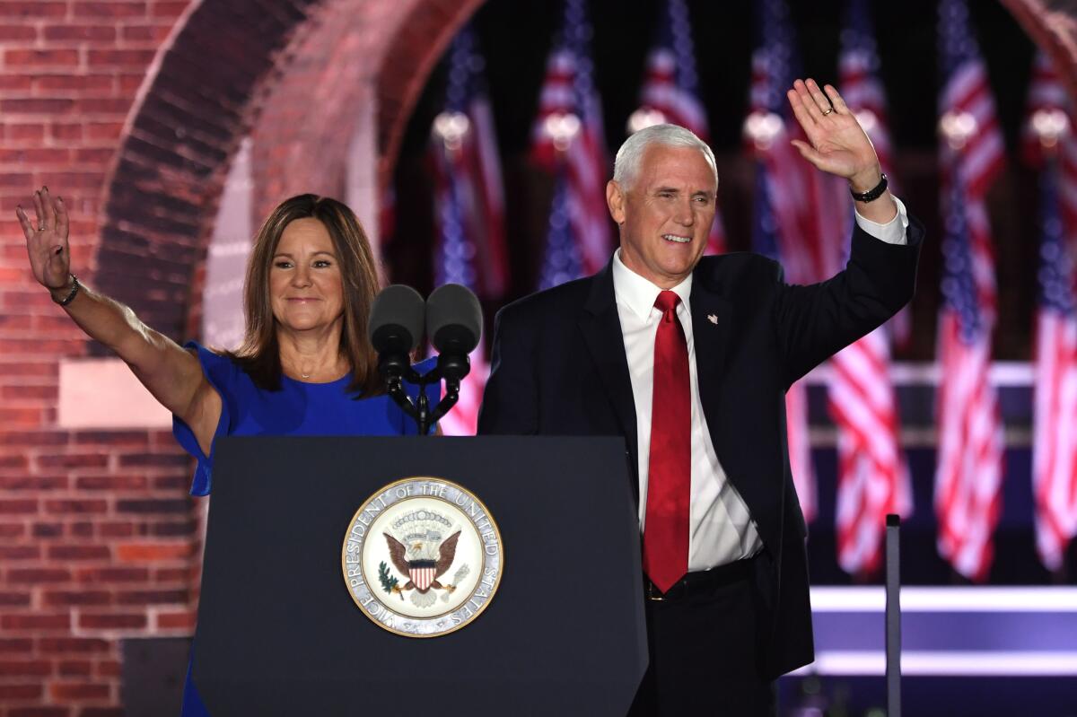 Vice President Mike Pence and his wife, Karen, wave at the Republican convention
