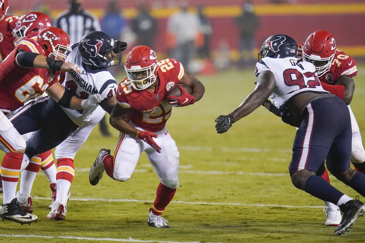 Kansas City Chiefs running back Clyde Edwards-Helaire (25) carries the ball against the Houston Texans in the second half of an NFL football game Thursday, Sept. 10, 2020, in Kansas City, Mo. (AP Photo/Jeff Roberson)