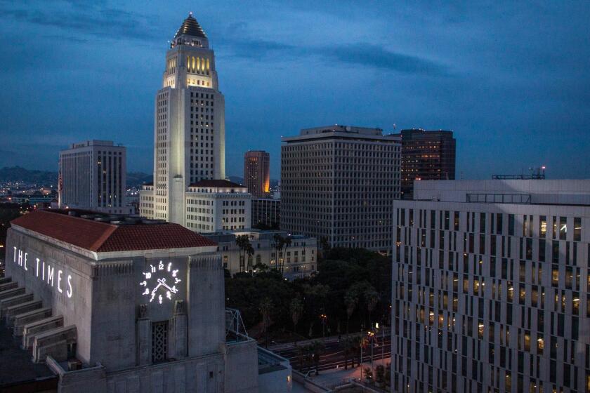 Mar. 28, 2013: Photo of Los Angeles Times building and Los Angeles City Hall taken from roof of Times South building.