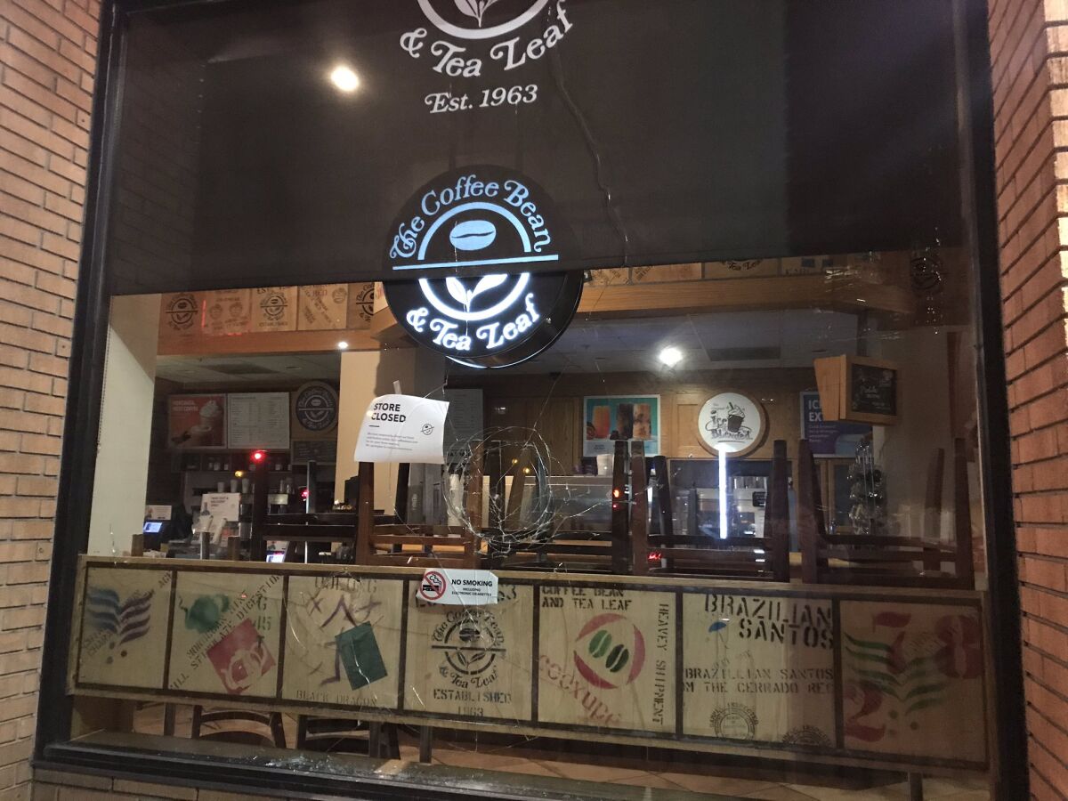 The window of a coffee business was damaged late Sunday evening in downtown San Diego.