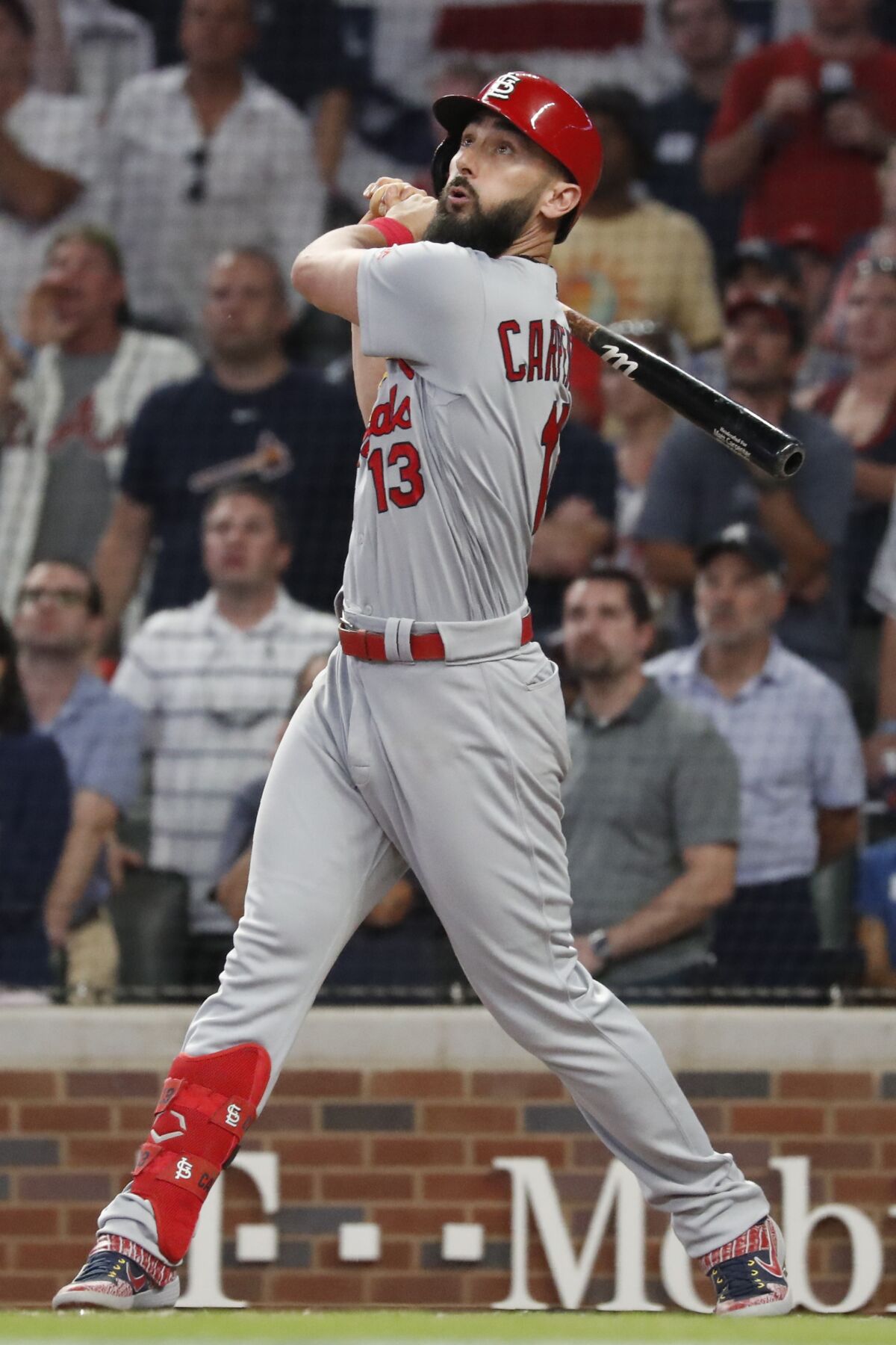 St. Louis Cardinals third baseman Matt Carpenter (13) watches his his RBI single in the eighth inning during Game 1 of a best-of-five National League Division Series agaimst the Atlanta Braves, Thursday, Oct. 3, 2019, in Atlanta. (AP Photo/John Bazemore)