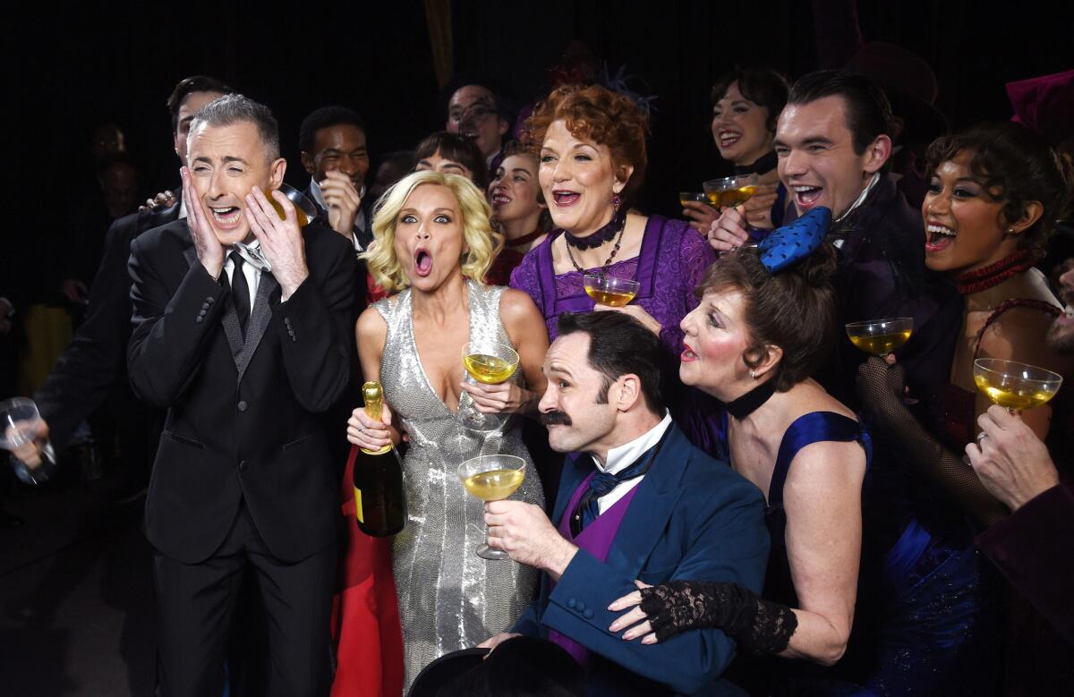 Hosts Alan Cumming and Kristin Chenoweth pose with the cast of "Gigi" backstage at the 2015 Tony Awards at Radio City Music Hall on June 7 in New York City.