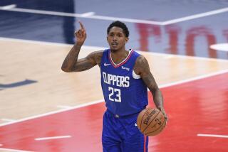 Los Angeles Clippers guard Lou Williams (23) dribbles the ball during the second half of an NBA basketball game against the Washington Wizards, Thursday, March 4, 2021, in Washington. The Wizards won 119-117. (AP Photo/Nick Wass)