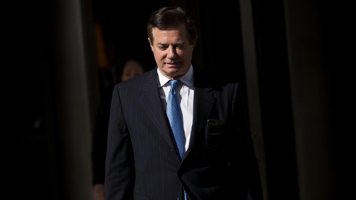 Paul Manafort, President Trump's former campaign manager, leaves the federal courthouse in Washington.