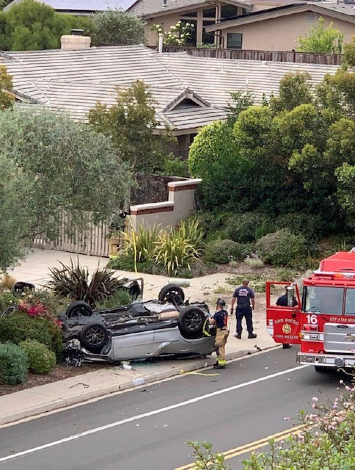 A car flipped on Cardeno Drive, knocking over a San Diego Gas & Electric utility box and causing a power outage in the area.