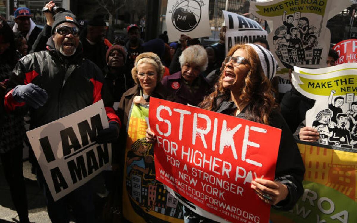 New York City fast food workers rally at a one-day strike on April 4.