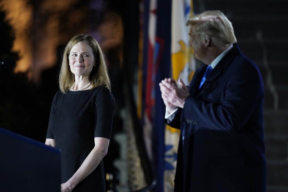 President Trump with Amy Coney Barrett at the White House