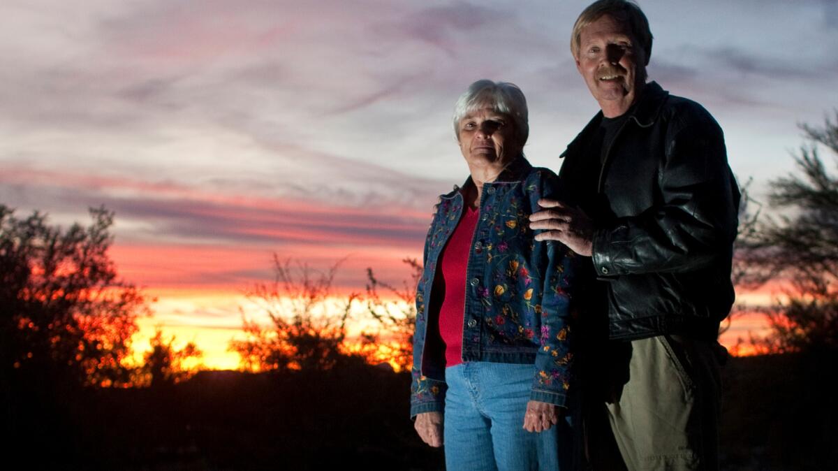 Tucson mass shooting survivor Patricia Maisch and her husband, John.