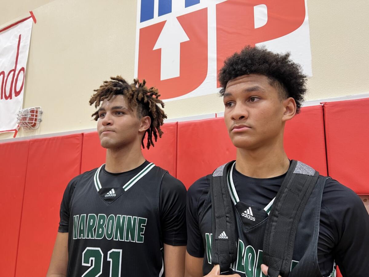 Brothers Marcus Adams Jr. (left) and Maximo led Narbonne to a 64-62 win over Long Beach Millikan.