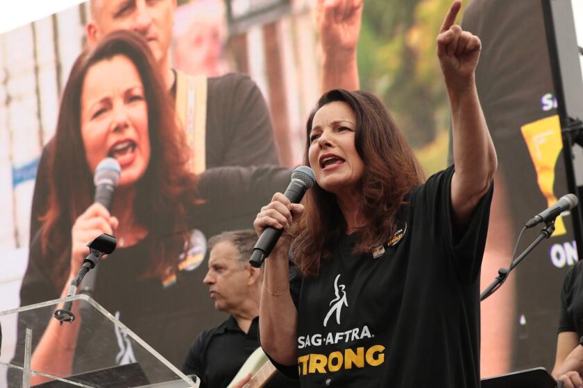 who plays ghost of christmas future in spirited LOS ANGELES CA SEPTEMBE 13, 2023 -- SAG-AFTRA president Fran Drescher addresses striking writers and actors in a boisterous rally outside Paramount studios on Wednesday, Sept. 13, 2023. The Writers Guild of America has been on strike since early May. The SAG-AFTRA actors' union joined the writers on the picket lines in July. (Al Seib / For The Times)