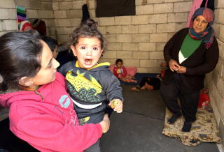 Badriyah Ayyash, a Syria refugee fleeing sectarian violence, came with her grandchildren to north Lebanon.