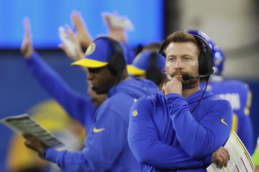 Rams coach Sean McVay has a pensive look on his face as he watches action against the Saints.