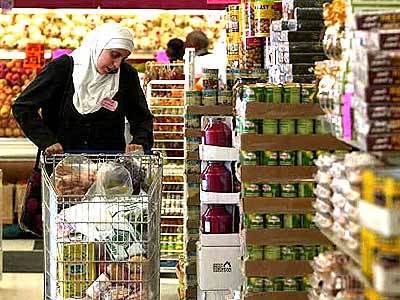A shopper at Al Tayebat Grocery