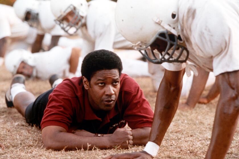 Washington tackled the role of Alexandria, Va., high school football coach Herman Boone, who in 1971 defied prejudice and led his racially integrated team to the state championship.