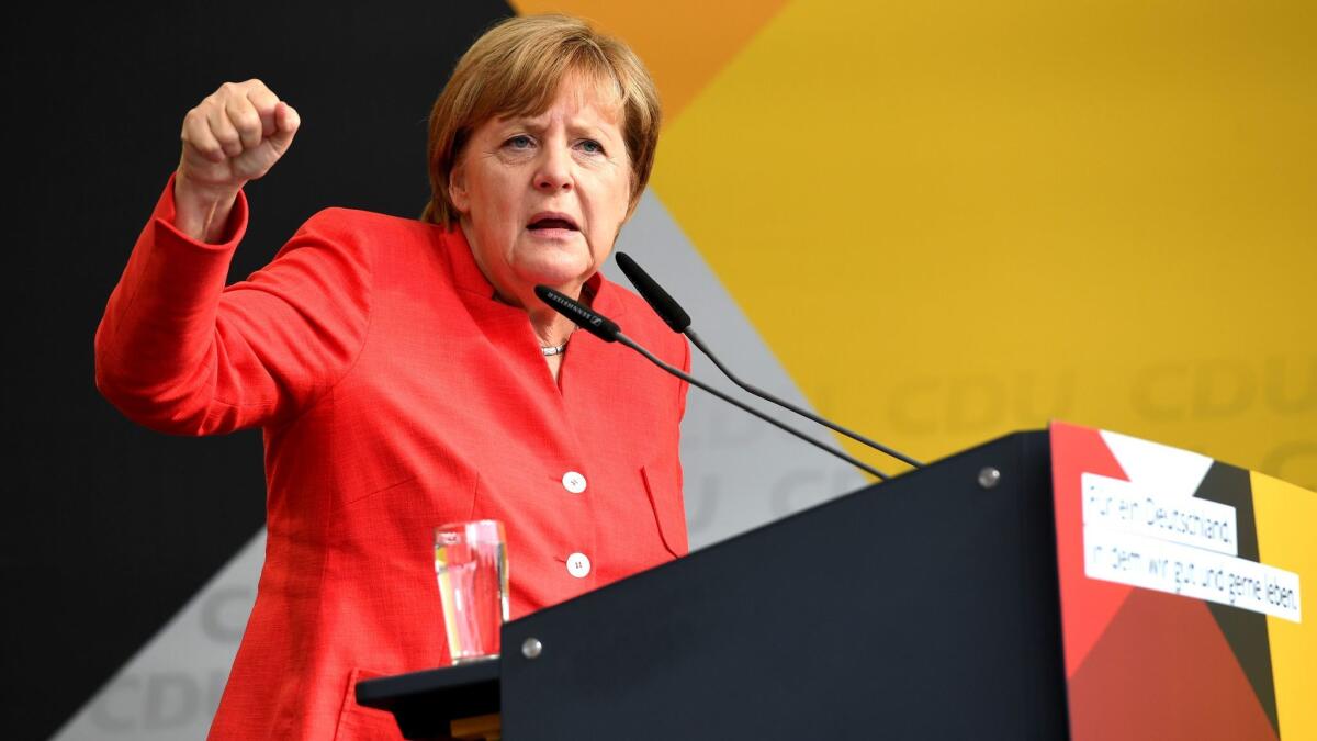 German Chancellor Angela Merkel delivers a speech during an election campaign event of the Christian Democratic Union party in Cuxhaven, western Germany, on August 15, 2017.