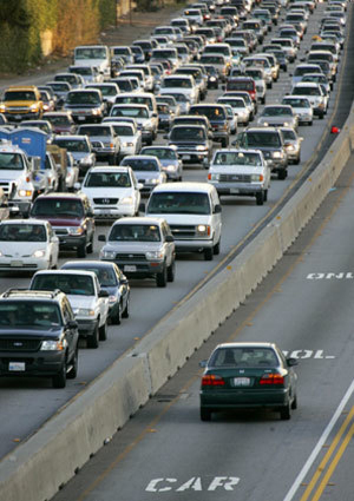 BARELY MOVING: Gridlock on the 405 is a familiar sight. County officials propose converting some carpool lanes to toll lanes, but the 405 is not included in the initial plan.
