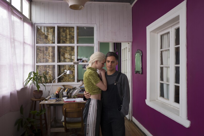 Mariana Di Girolamo and Gael García Bernal embrace in a scene from the movie "Ema."
