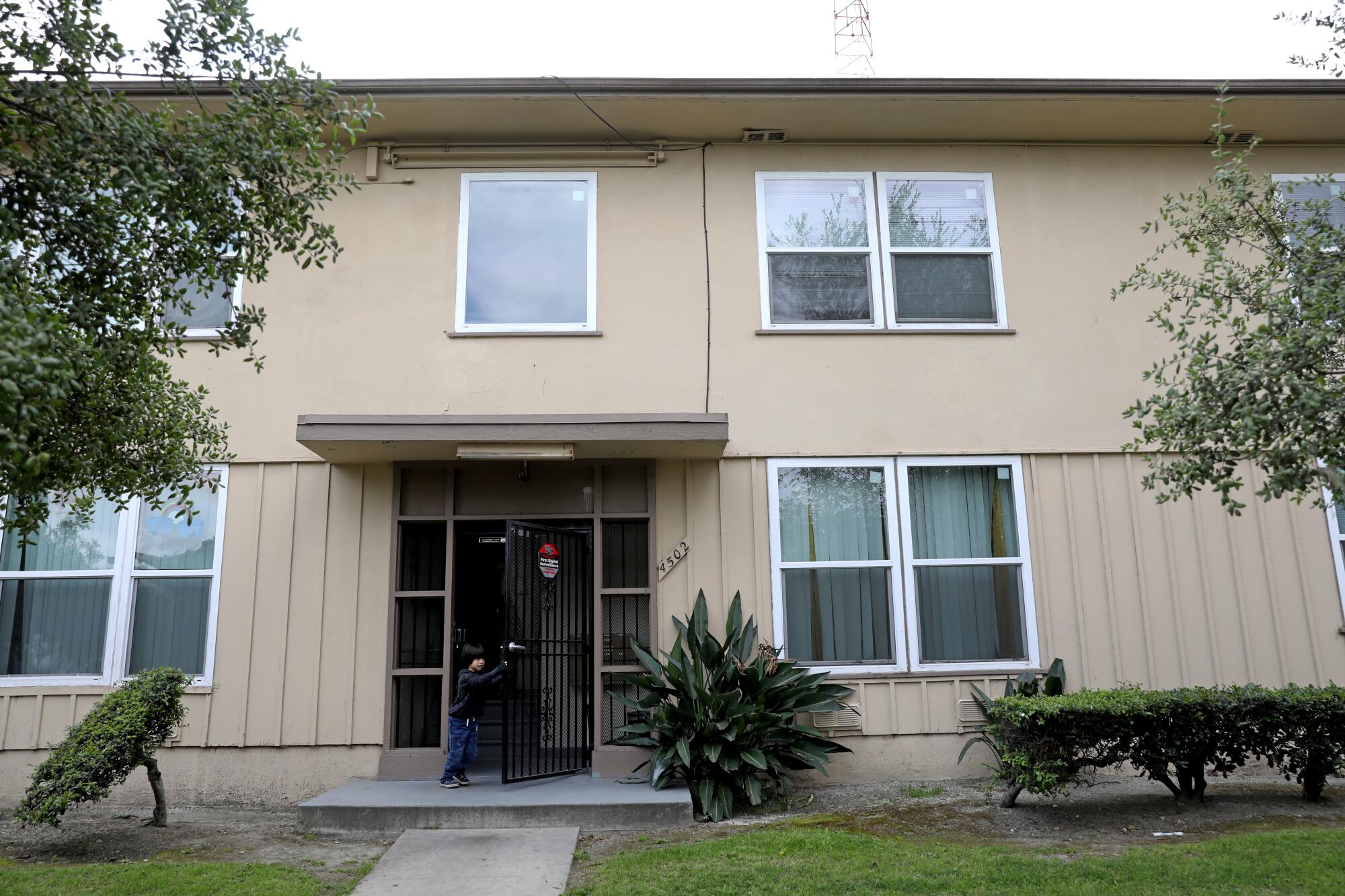 Liam Ponce, 5, son of Martha Martinez, at their apartment at the Chesapeake Apartments in Los Angeles.