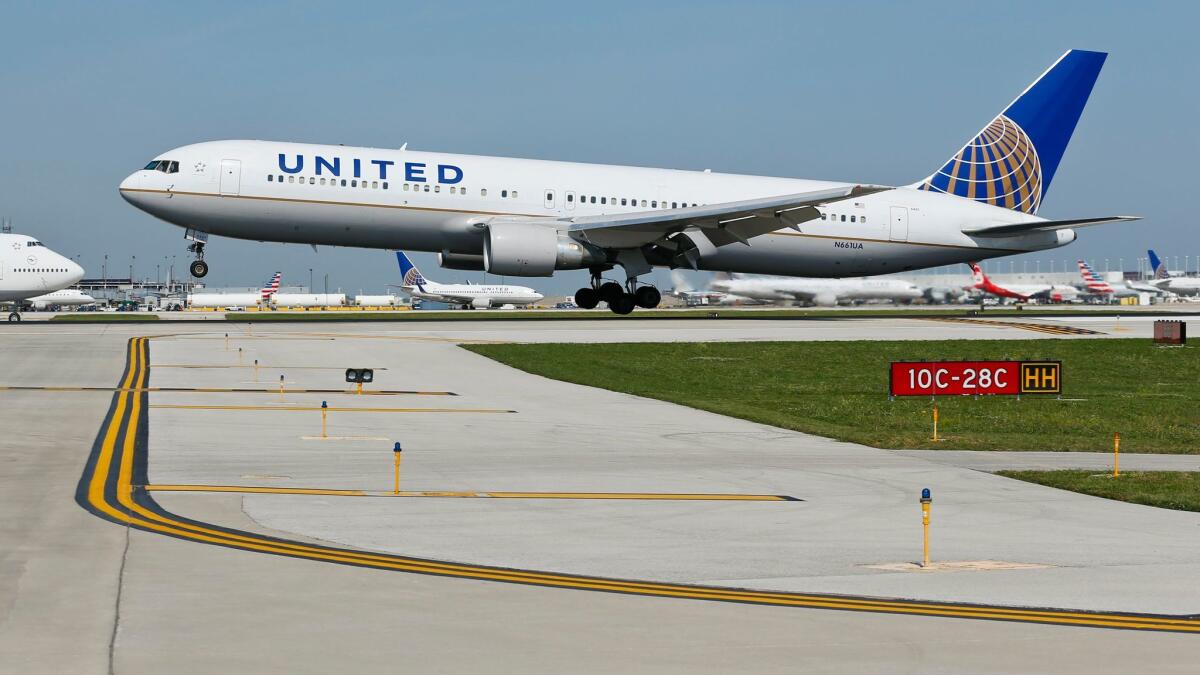 A United Airlines jet arrives at the O'Hare International Airport in Chicago on Sept. 19, 2014.