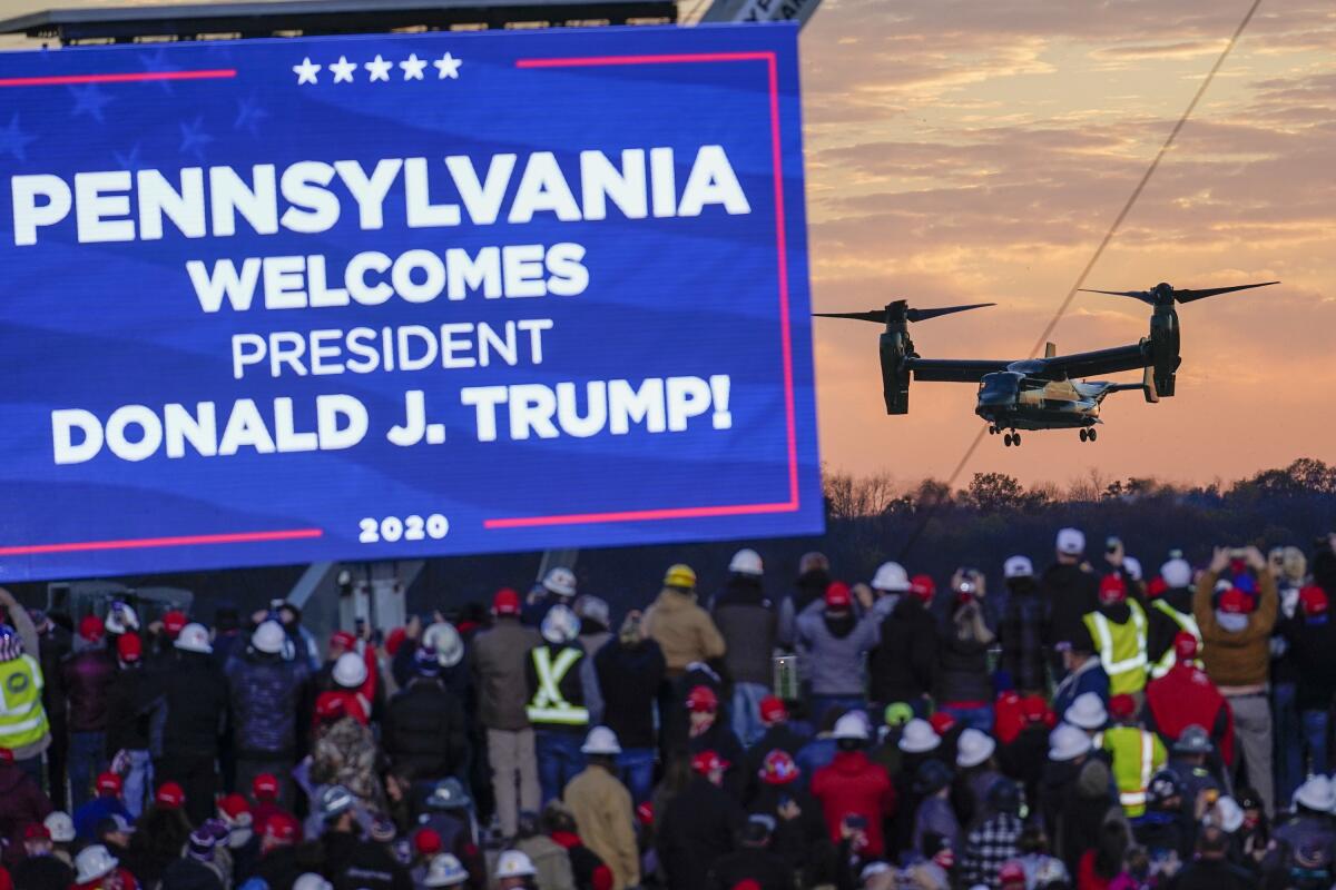 FIL - In this Oct. 31, 2020 file photo, the crowd watches one of the three Osprey aircraft escorting Marine One for a campaign stop by President Donald Trump at the Butler County Regional Airport in Butler, Pa. Pennsylvania's Republican-controlled Senate is considering an investigation into how last year's presidential election was conducted, a quest fueled by former President Donald Trump's baseless claims that fraud was behind his loss in the battleground state. (AP Photo/Keith Srakocic)