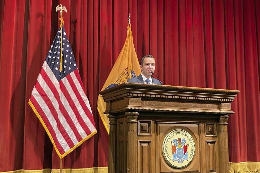 FILE - Matt Platkin speaks in Trenton, N.J., Feb. 3, 2020. Platkin, New Jersey's top law enforcement official, brought criminal charges Monday, Feb. 6, 2023, against Jerry Moravek, a Paterson Police officer he said shot a fleeing person in the back, wounding him severely. (AP Photo/Mike Catalini, File)