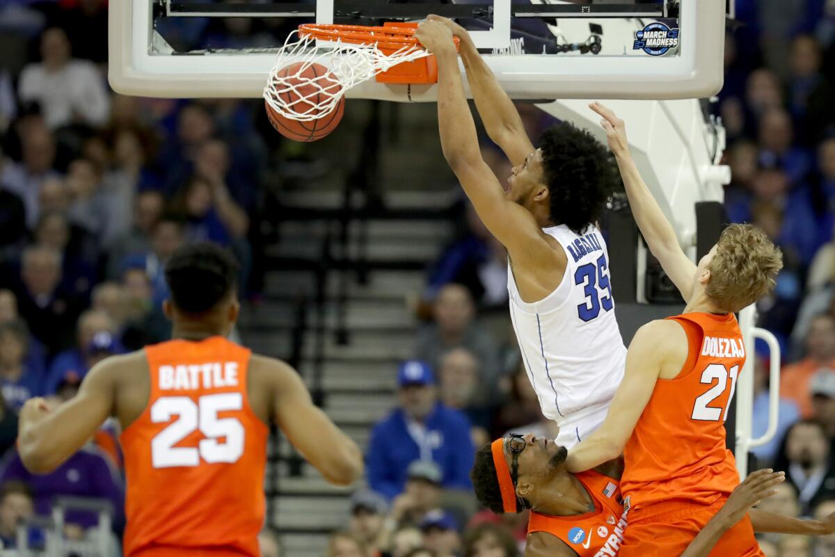 Duke forward Marvin Bagley III dunks the ball against Syracuse during the second half Friday night.