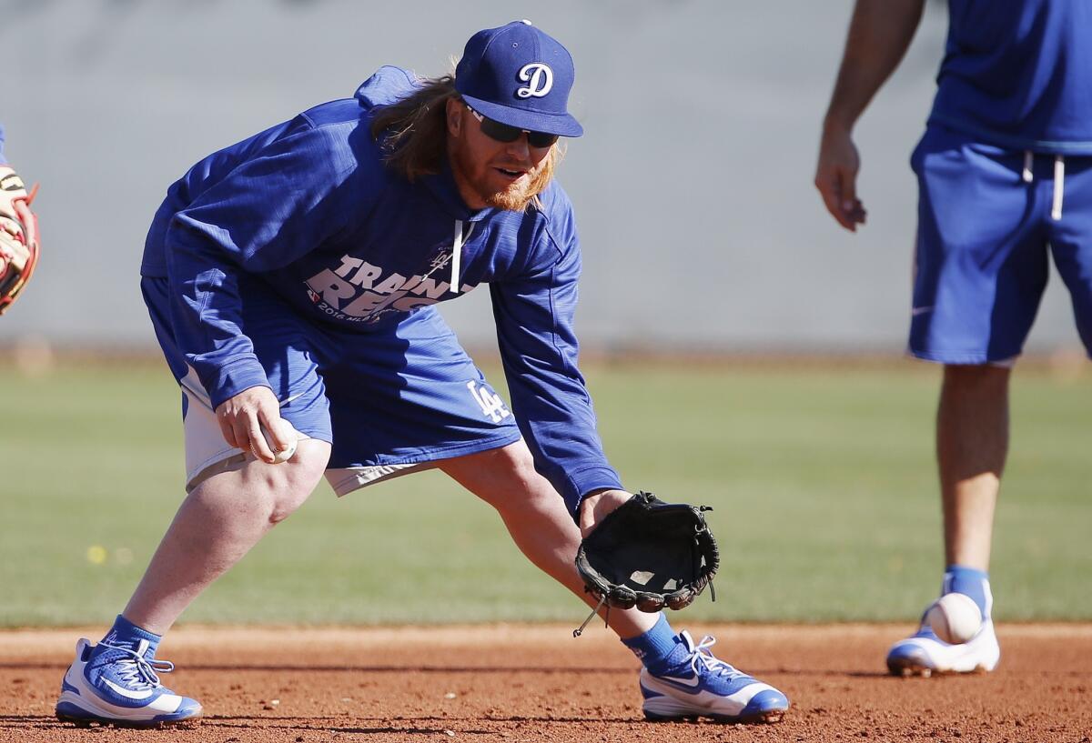 The Dodgers' Justin Turner takes part in spring training in Glendale, Ariz., on Feb. 24.