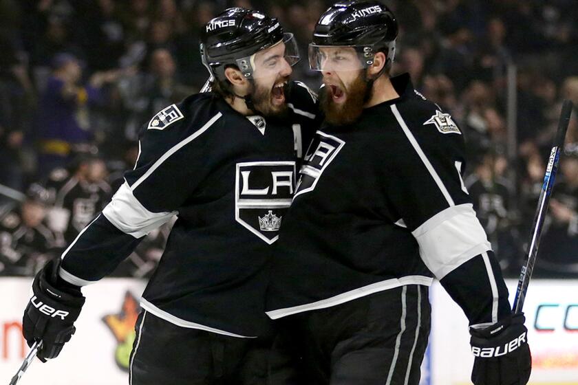 The Kings' Drew Doughty, left, and Jake Muzzin became NHL champions, but growing up in Canada they were also accomplished soccer players.