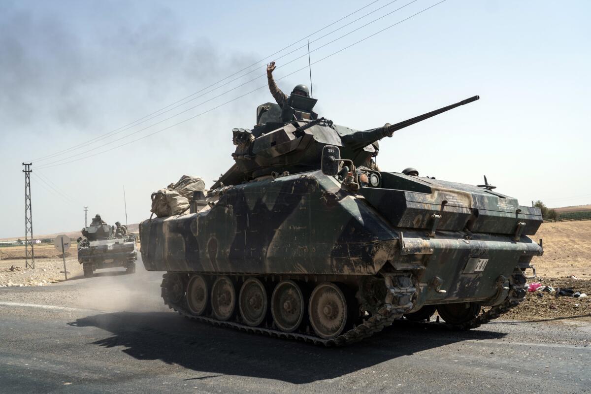 Turkish troops head to the Syrian border, in Karkamis, Turkey, on Aug. 27, 2016. Turkey on Wednesday sent tanks across the border to help Syrian rebels retake the key Islamic State-held town of Jarabulus.