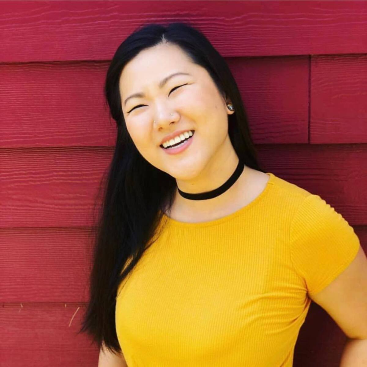 Lauren Cho in a yellow shirt.