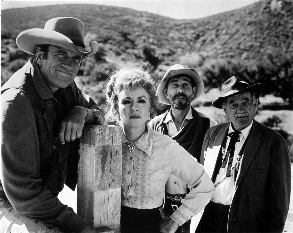 James Arness, left, Amanda Blake, Ken Curtis and Milburn Stone in "Gunsmoke."