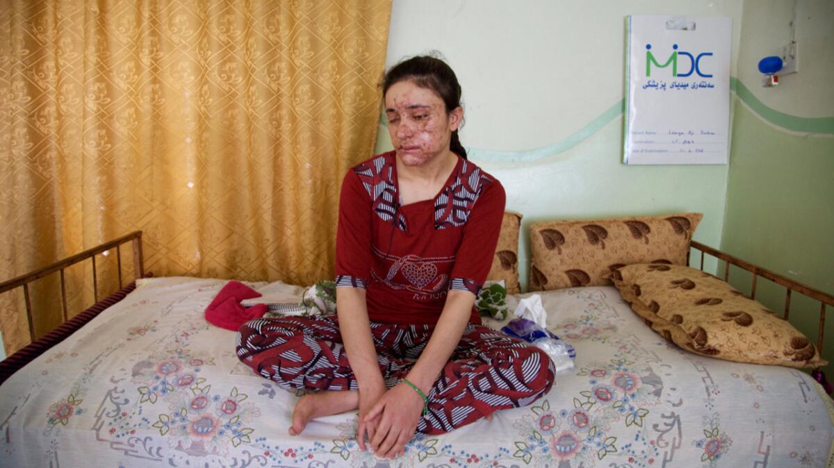 Lamiya Aji Bashar, an 18-year-old Yazidi who escaped her Islamic State enslavers, talks to the Associated Press in northern Iraq on May 5.