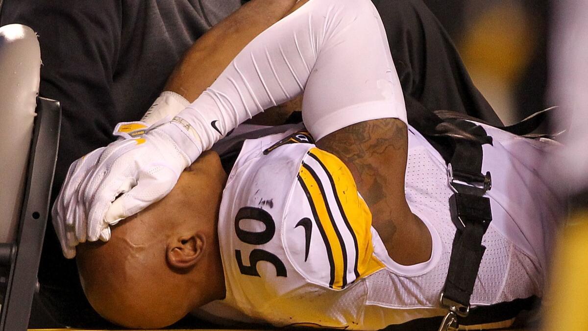 Pittsburgh's Ryan Shazier reacts as he is carted off the field after a injury during a game against Cincinnati Bengals on Dec. 4.