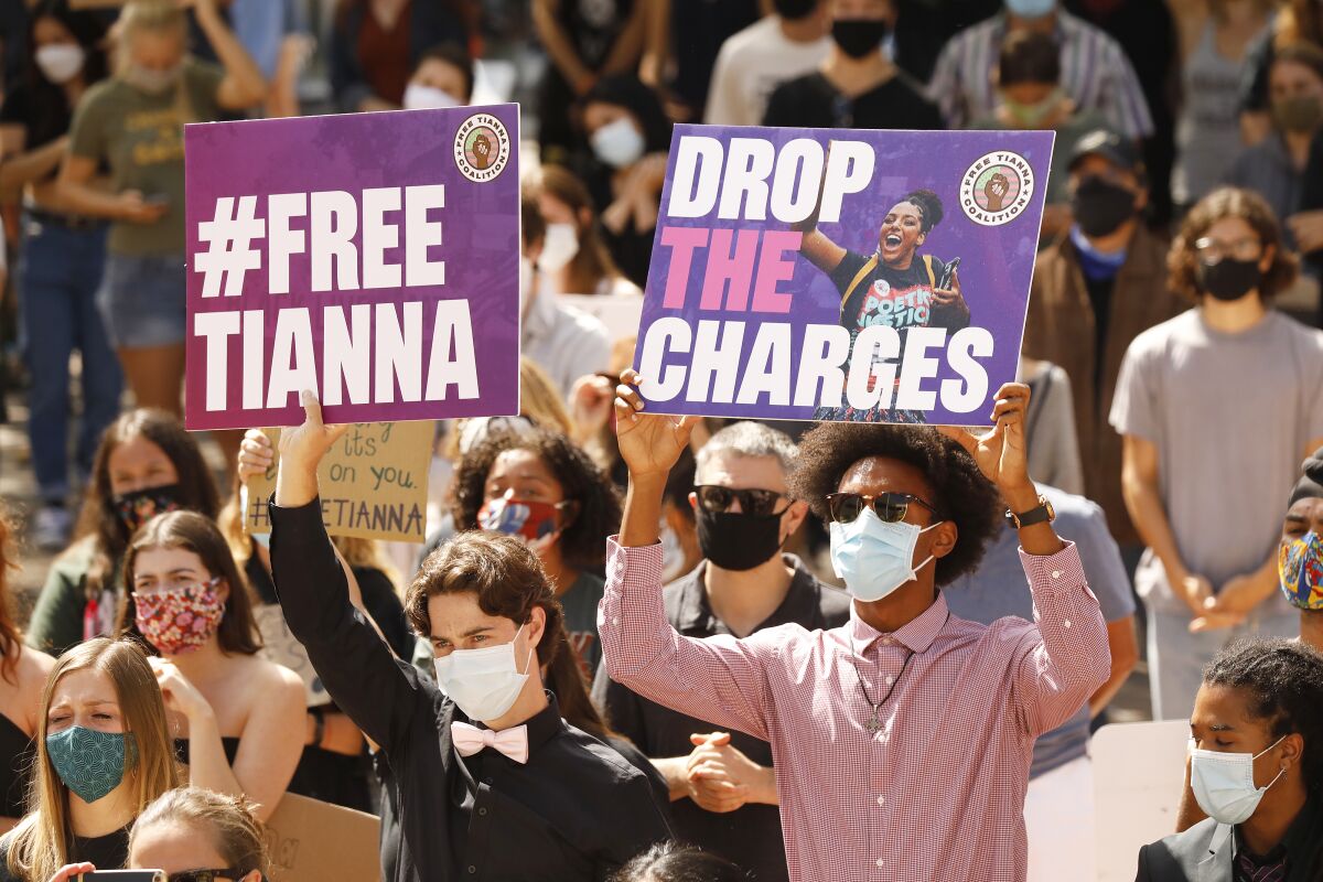 Supporters of activist Tianna Arata rally outside the San Luis Obispo County courthouse.