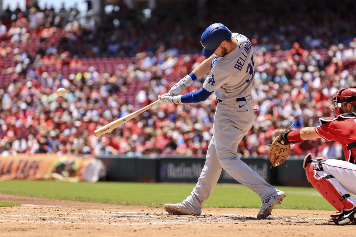 Cody Bellinger hits a sacrifice fly during the second inning of the Dodgers' win over the Cincinnati Reds on Thursday.