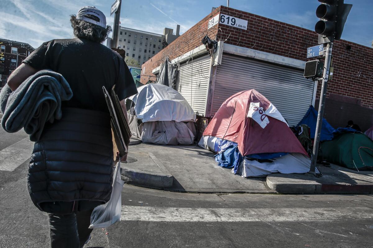 Tents lined up along 6th St. on Skid Row, downtown. 