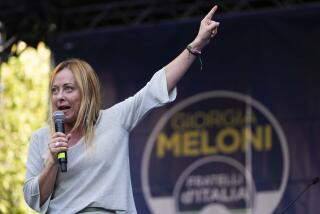 Right-wing party Brothers of Italy's leader Giorgia Meloni addresses a rally as she starts her political campaign ahead of Sept. 25 general elections, in Ancona, Italy, Tuesday, Aug. 23, 2022. (AP Photo/Domenico Stinellis)