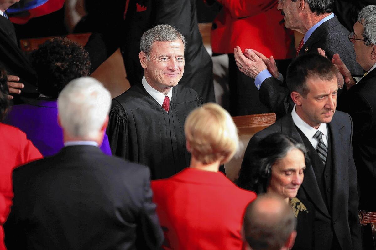 Supreme Court Chief Justice John G. Roberts Jr. arrives in the House Chamber before the State of the Union address in January.