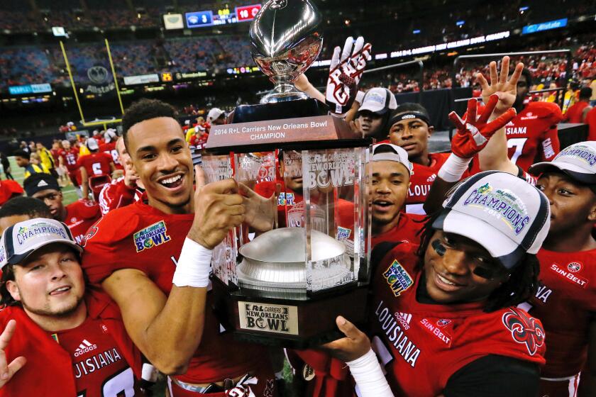 Louisiana-Lafayette players after defeating Nevada, 16-3, in the New Orleans Bowl on Saturday.