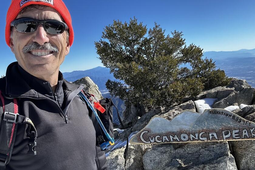 Hiker Eric Lewis of Riverside At Cucamonga Peak summit on Dec. 24, 2022. (Courtesy of Eric Lewis)