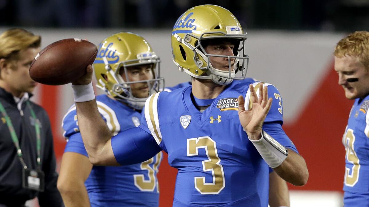 UCLA quarterback Josh Rosen warms up before the Cactus Bowl game Tuesday night. He would not be in helmet and pads for the game.
