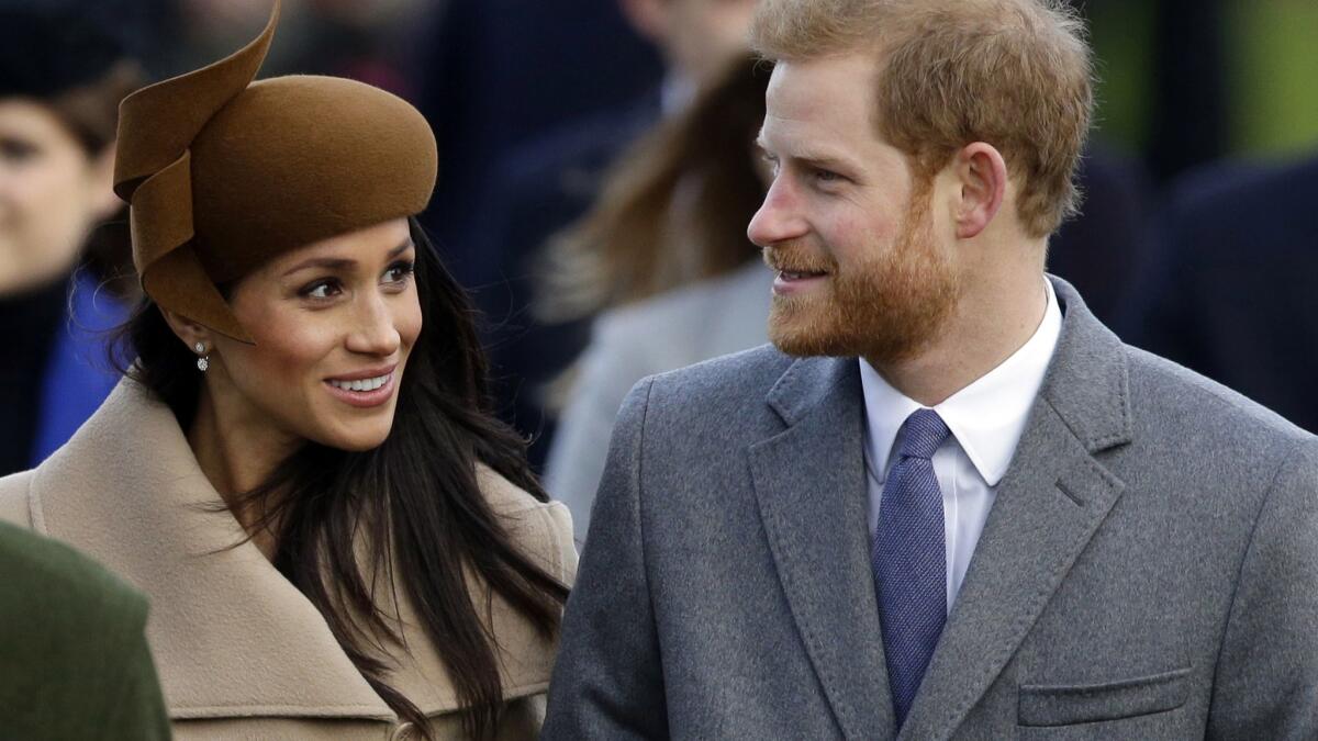 Britain's Prince Harry and his fiancee Meghan Markle.